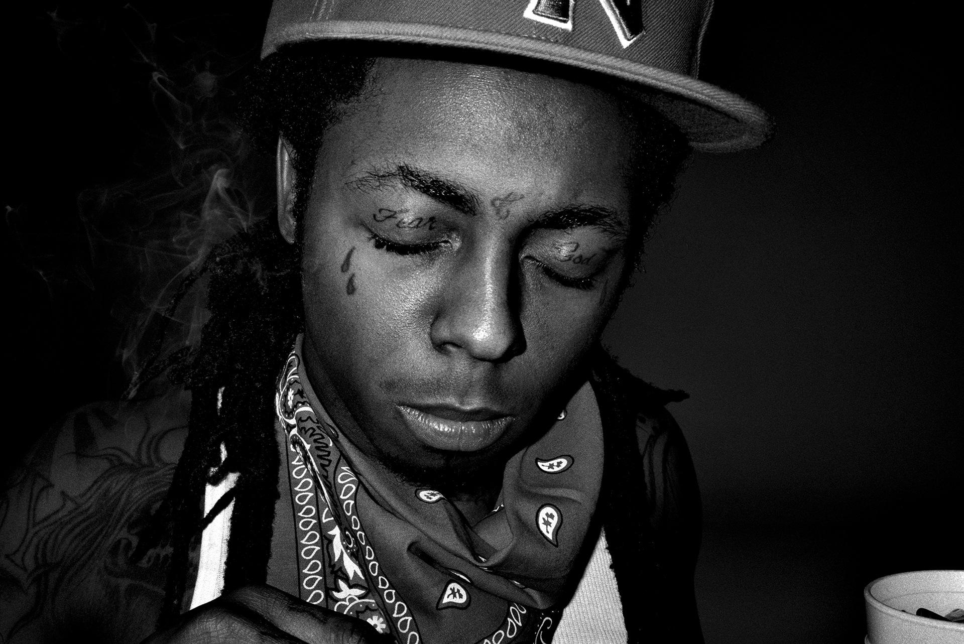 Rapper Lil Wayne with teardrop tattoos under his eyes, source: Wikipedia