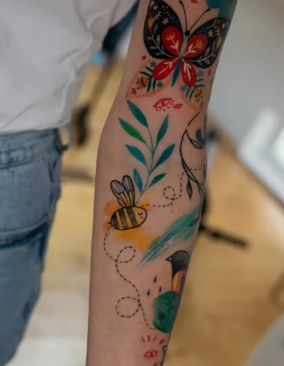 Beautiful tattoo with watercolour splash effects by @inna_nameless