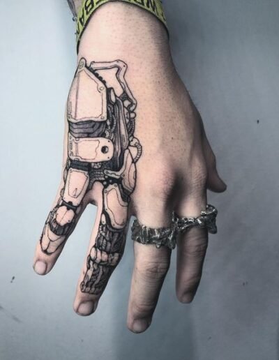 Biomechanical hand tattoo by Eddie Bird @eddiexbird