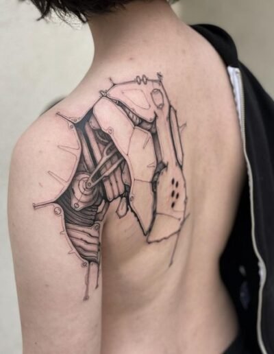 Biomechanical tattoo by Eddie Bird @eddiexbird