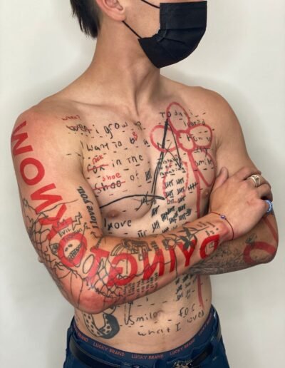 Script and lettering tattoo by Caleb Blansett