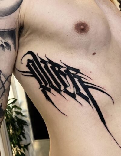 Script and lettering tattoo over by Angelo Hardman @hardman.tattoo