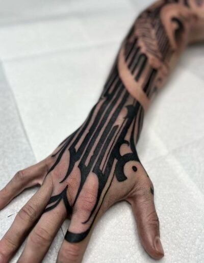 Script and lettering tattoo sleeve (artist unknown) via Pinterest