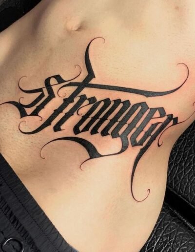 Script and lettering tattoo stronger by @broken_script_gang_uk