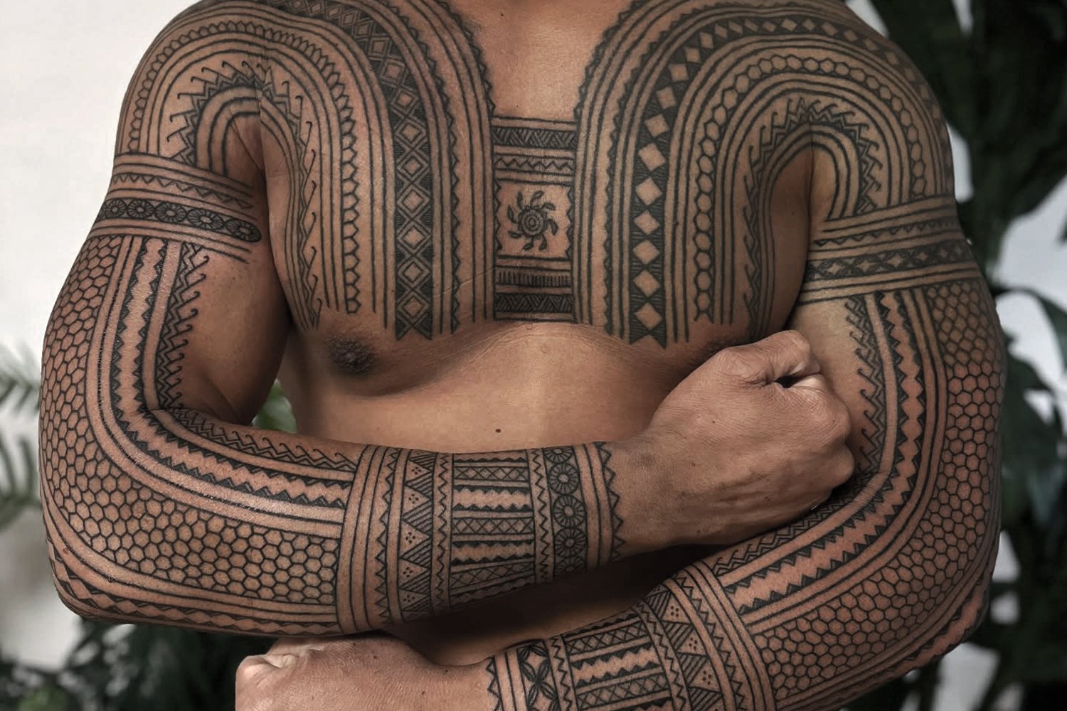 Filipino tattooing: Tatak (batok) chest and sleeves tattoo by Ayla Roda @tatakbyayla