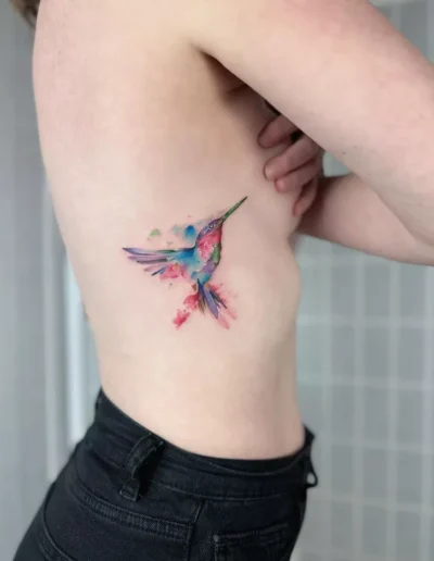 Watercolour hummingbird tattoo by @alitattoos