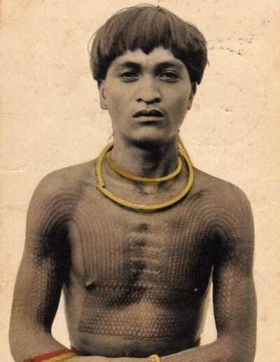 Filipino tattooing: A 1908 photo of a Bontoc warrior bearing a headhunter's chaklag chest tattoo