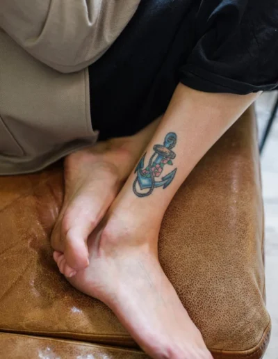 Anchor tattoo photographed by Ksenia Chernaya via Pexels