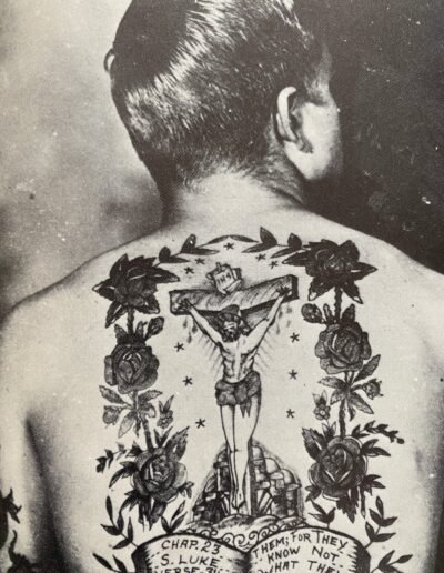 Anonymous photograph of a man wit a Christian tattoo from Heavily Tattooed Men And Women by Spider Webb, McGraw Hill, 1976