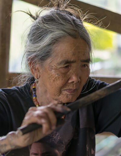 Filipino tattooing: Apo Whang-od applying traditional Kalinga tattoos (batok) using the characteristic Austronesian tattooing tools - the hafted needle and the mallet