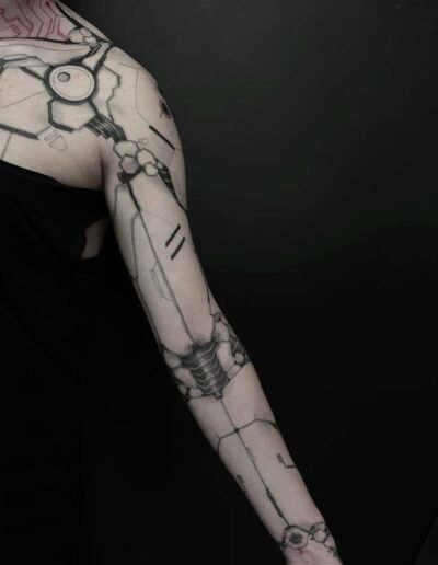 Biomechanical tattoo sleeve by Alexander Sonnov @astattooru