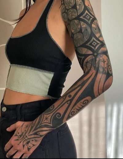 Blackwork ornamental sleeve coverup (artist unknown) via Pinterest