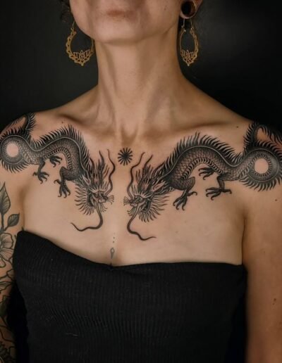 Dragon tattoo (artist unknown) via Pinterest