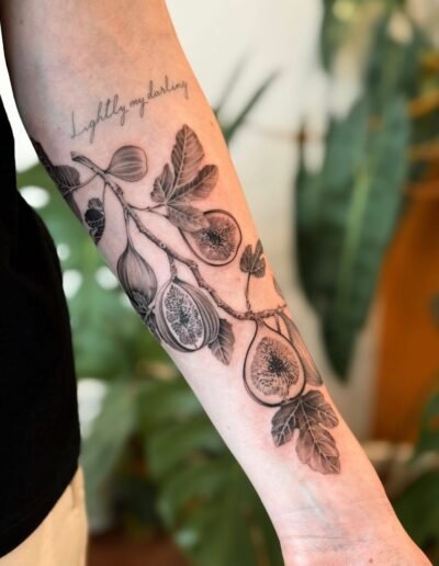 Fig branch tattoo by SAV @savv.ink