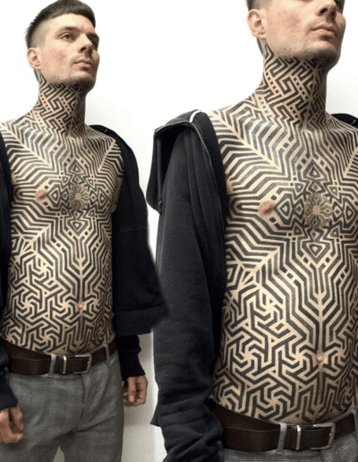 Geometric blackwork tattoo by Tomas Tomas @tomastomas108