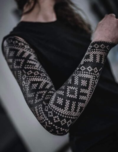 Geometric folk ornamental tattoo by Eddie Rise @eddie.rise