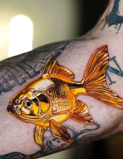 Gold goldfish tattoo by Pony Lawson @ponylawson