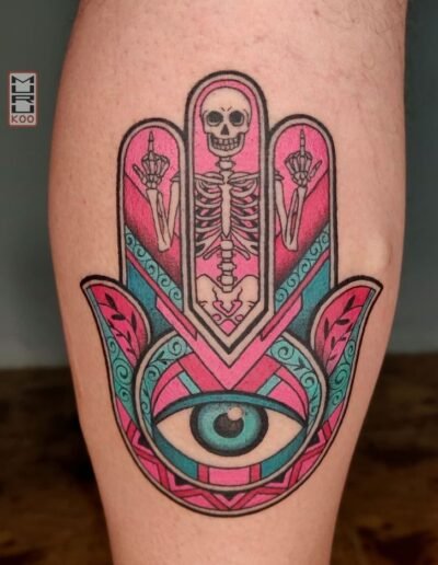 Hamsa with a skeleton tattoo (artist unknown) via Pinterest