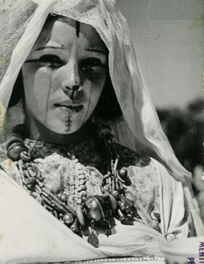 Jewish girl with ḥarqus, southern Morocco, ca. 1930, photography by Jean Belin