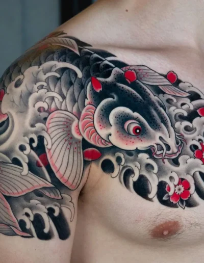 Koi fish tattoo by Jin Qchoi @jin_qchoi