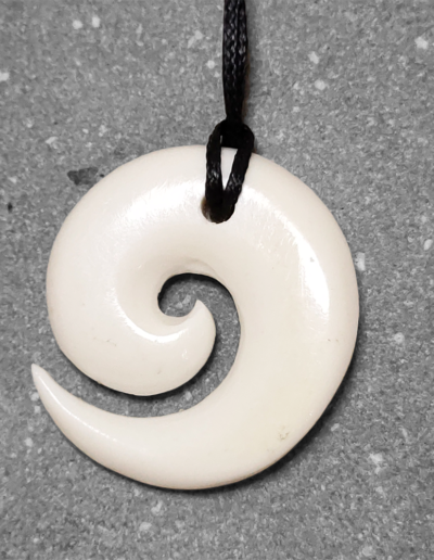 Koru, Spiral pendant by Jo Lolohea via Kura Auckland