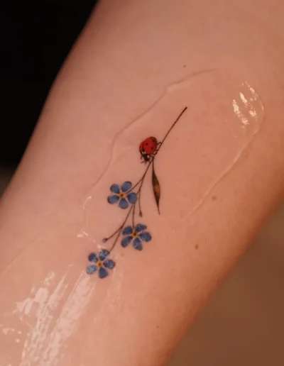 Ladybug tattoo by @eszter.tattoos