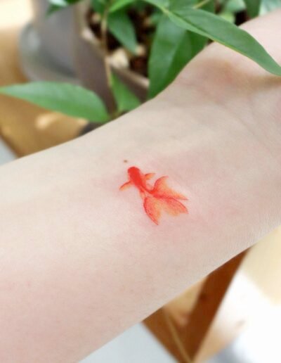Little goldfish tattoo by Eunyu @eunyutattoo