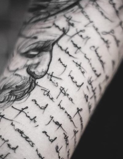 Long script tattoo by Yi @postyism