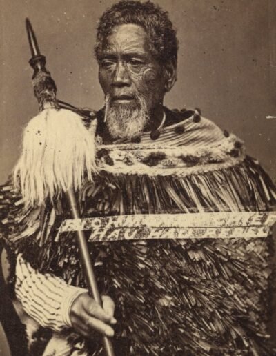 Maori chief holding a taiaha (between 1860 and 1879)