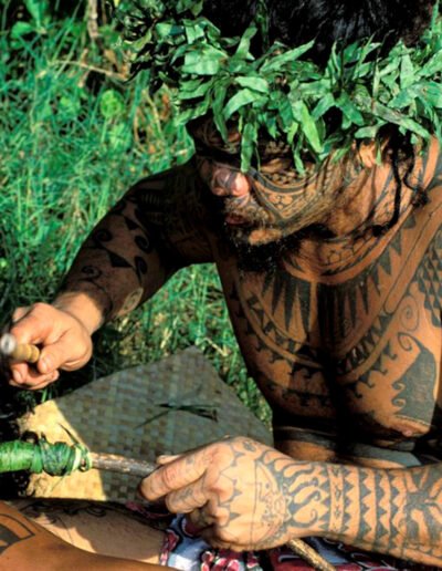 Marquesan tattoo in making, photo by Sylvain Grandadam, via Univers Voyage (universvoyage.com)