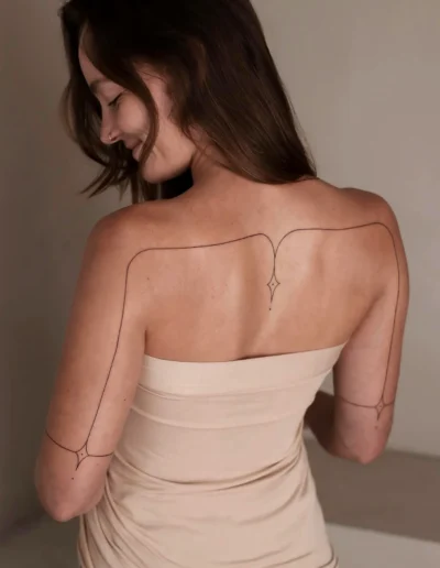 Minimalist ornamental line tattoo by Kris Mollink @krisontwerpt