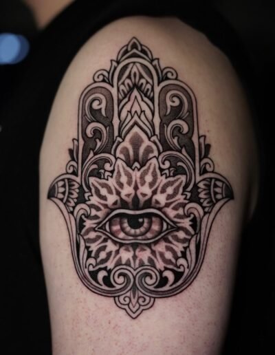 Ornamental blackwork hamsa tattoo by @niki___niki___niki
