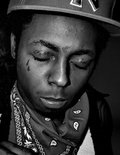 Rapper Lil Wayne with teardrop tattoos under his eyes, via Wikipedia, The Free Encyclopedia