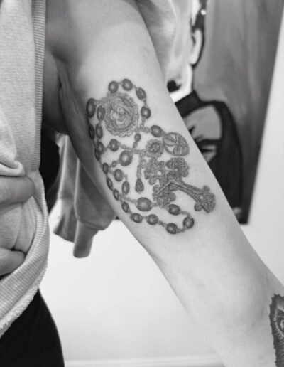 Rosary tattoo by Mark Mahoney @markmahoney_ssc