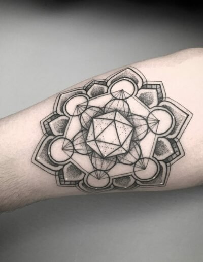 Metatron’s Cube motif, sacred geometry tattoo by Raul Wesche @weschetattoo