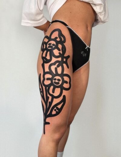 Sad flowers tattoo on the leg by Ivan Slay @ivanslay