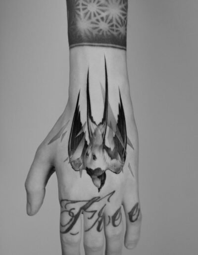 Swallow tattoo by Paweł Indulski @pawelindulski