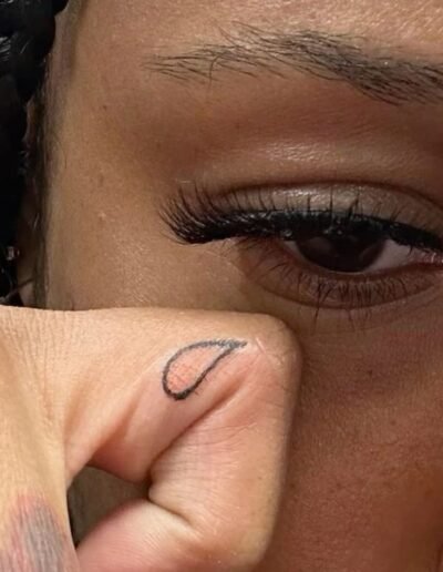 Teardrop tattoo (original source unknown) via Pinterest