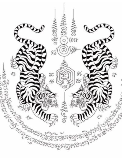 Sak Yant design with: Gao Yord (Nine Spires) on top, Twin Tigers (Suea Koo) under, and Hah Taew (Five Lines) twice on the sides.