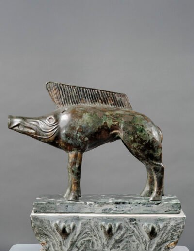 Treasure of Neuvy-en-Sullias, wild boar from 5th c. BC - 1st c. AD (the platform is AI-generated!). Orléanais Museum